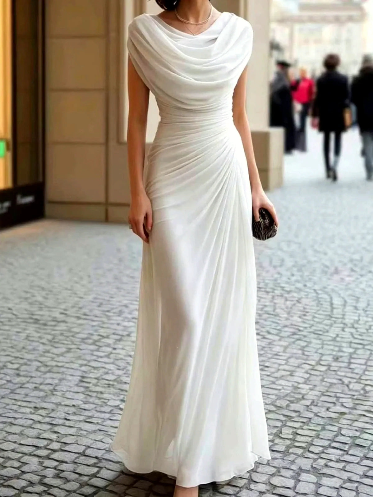 Women's draped cowl-neck ruched maxi dress in white, front model view.