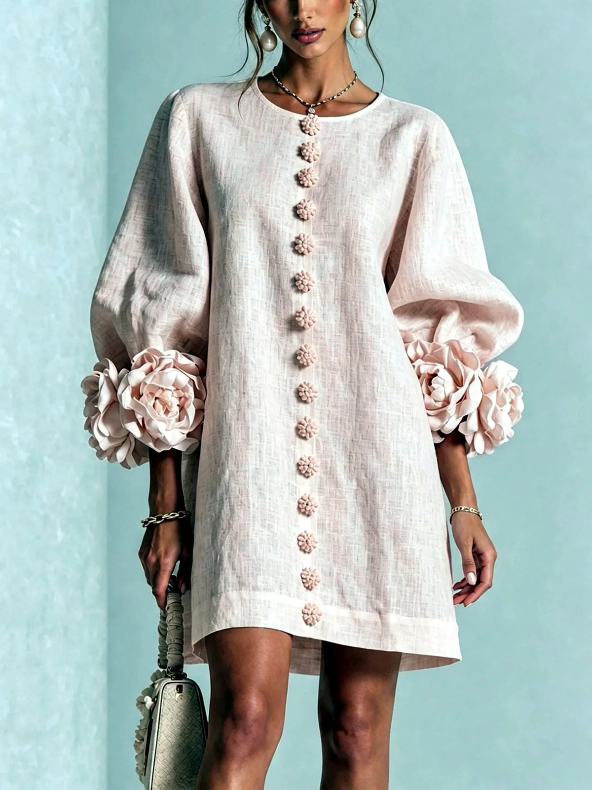Women's floral-cuff button-front relaxed dress in white, front model view.