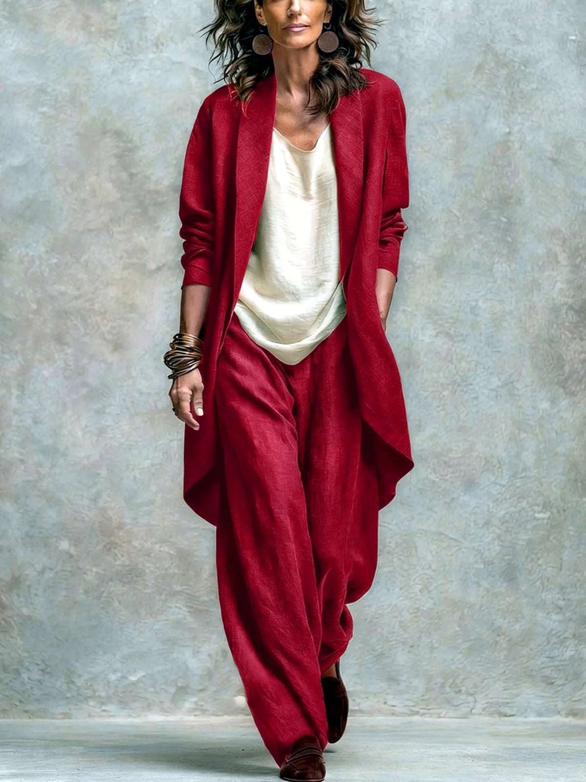 Women's linen-blend relaxed top and wide-leg pants set in burgundy, front model view.