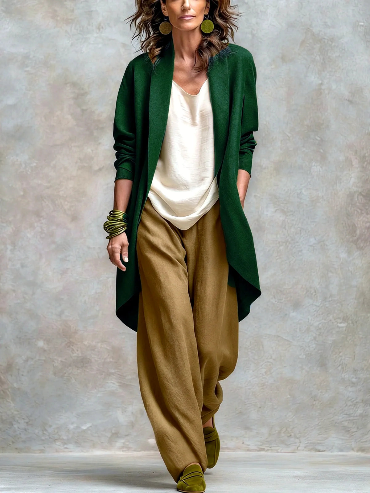 Women's linen-blend relaxed top and wide-leg pants set in green, model view with contrasting pants.