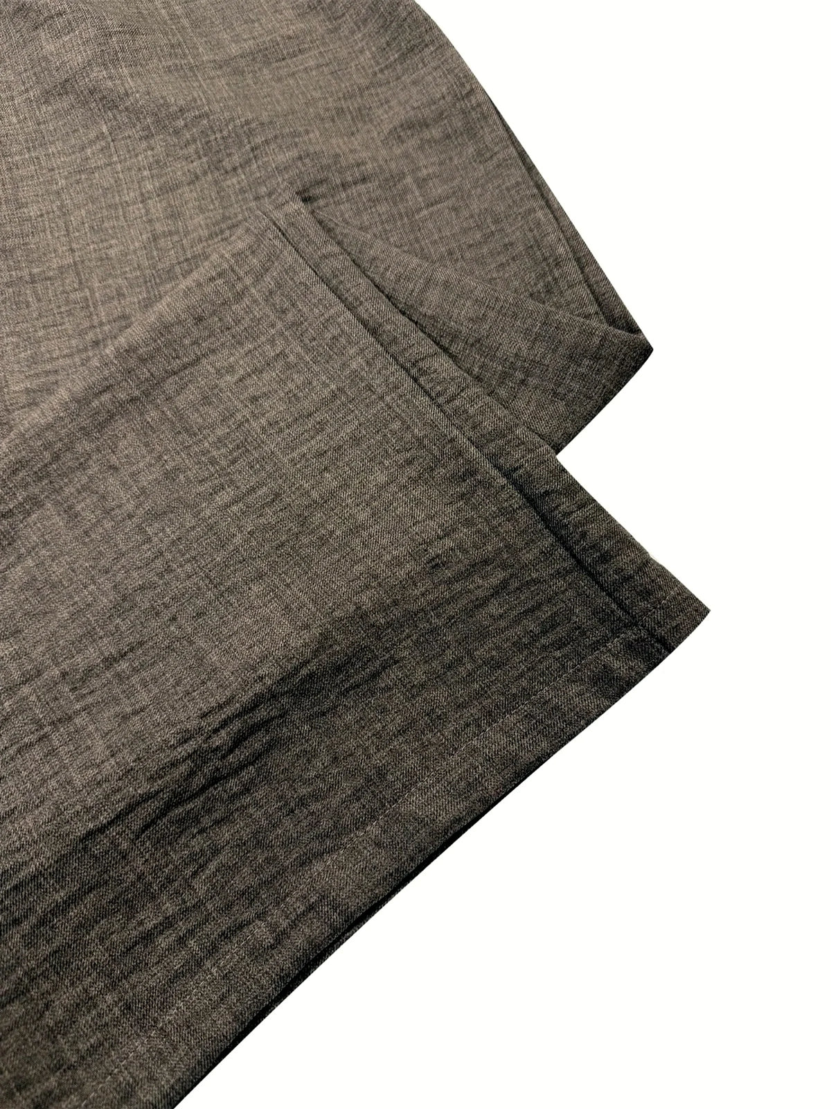 Women's linen-blend relaxed top and wide-leg pants set in taupe, hem and fabric texture detail.