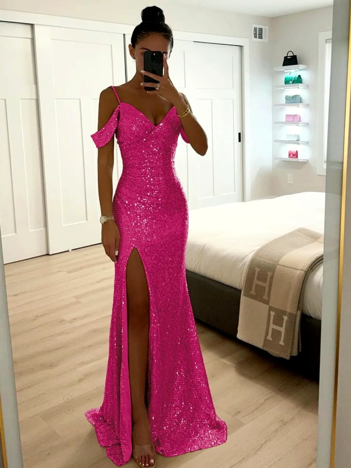 Women's sequin cold-shoulder slit evening gown in magenta, front mirror view.