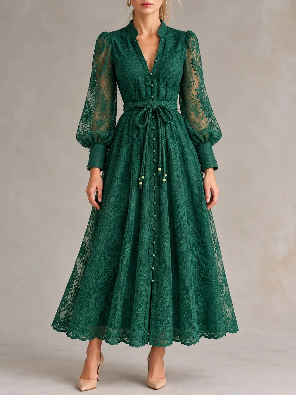 Women's V-neck floral lace long-sleeve dress in green, front model view.
