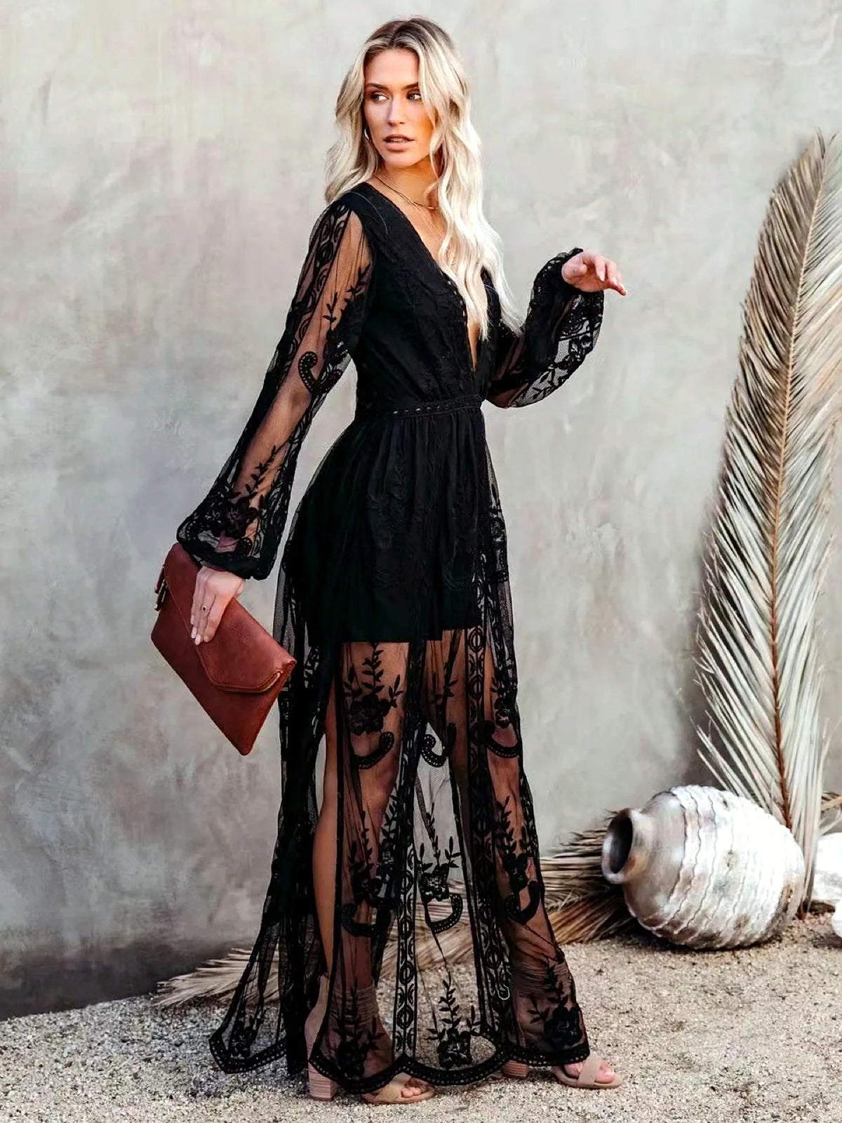 Women's V-neck long-sleeve sheer lace maxi dress in black, alternate front view.