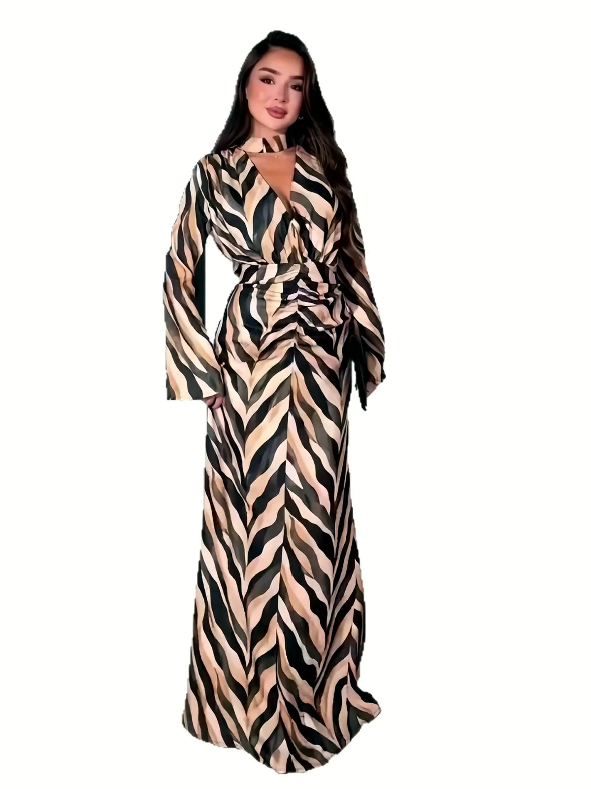 Women's zebra-print long-sleeve maxi dress in beige and black, isolated model view.