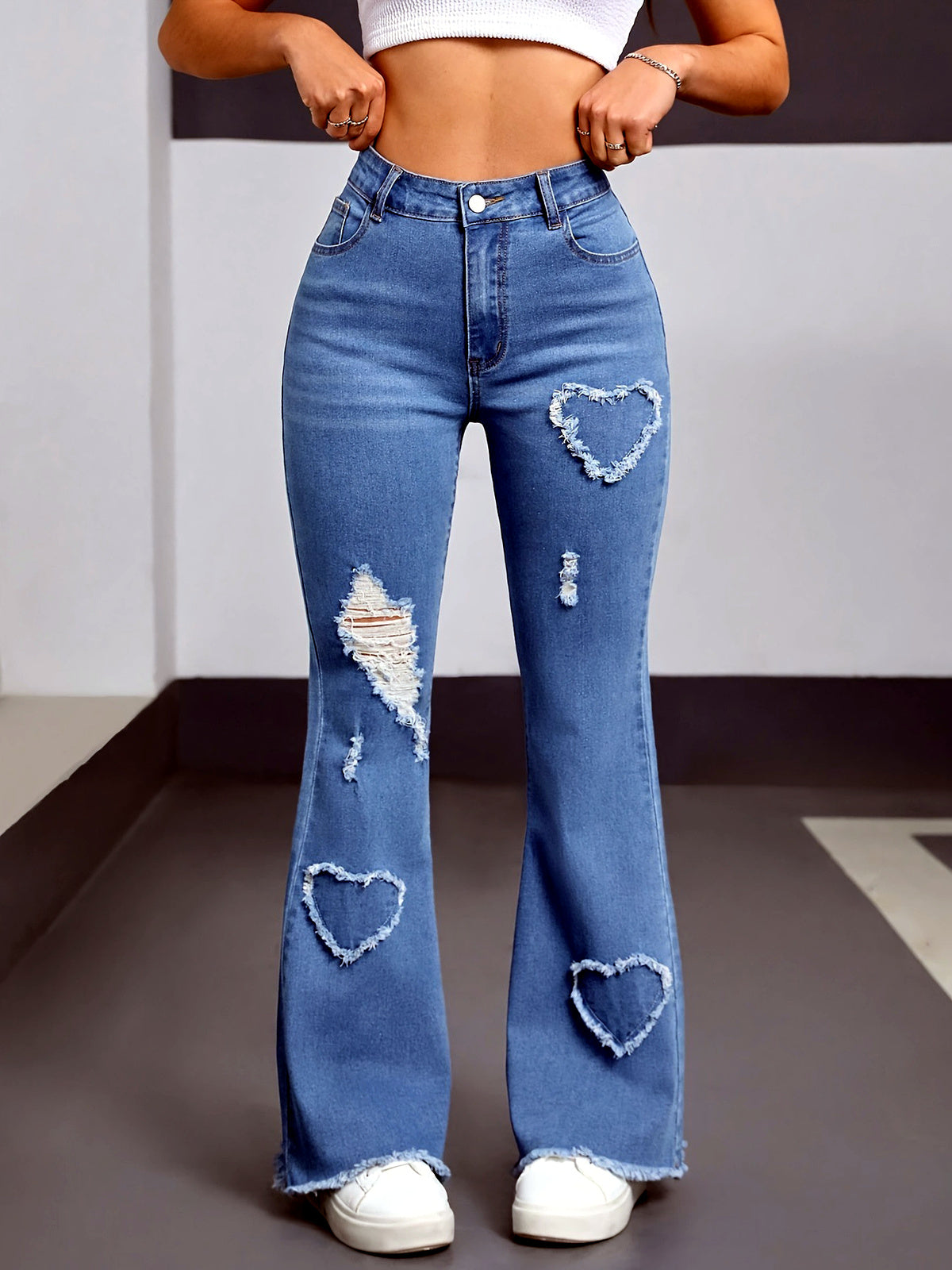 Women's Washed Denim Solid-Color Distressed Raw-Hem Mid-Rise Jeans in Light Blue - product view