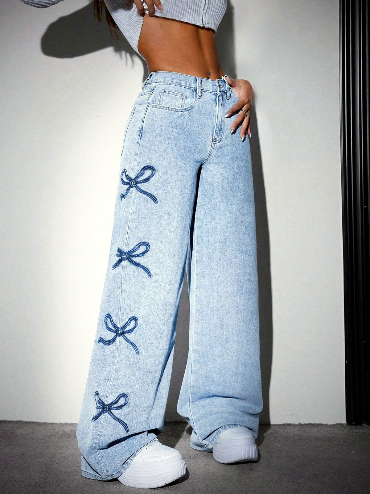 Washed Denim Printed Distressed High-Waist Wide-Leg Jeans in Light Blue - product view