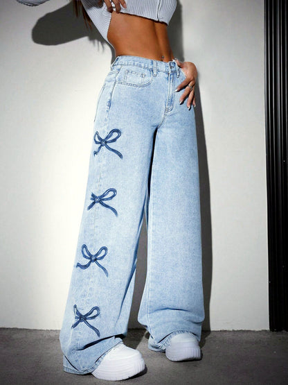 Washed Denim Printed Distressed High-Waist Wide-Leg Jeans in Light Blue - product view