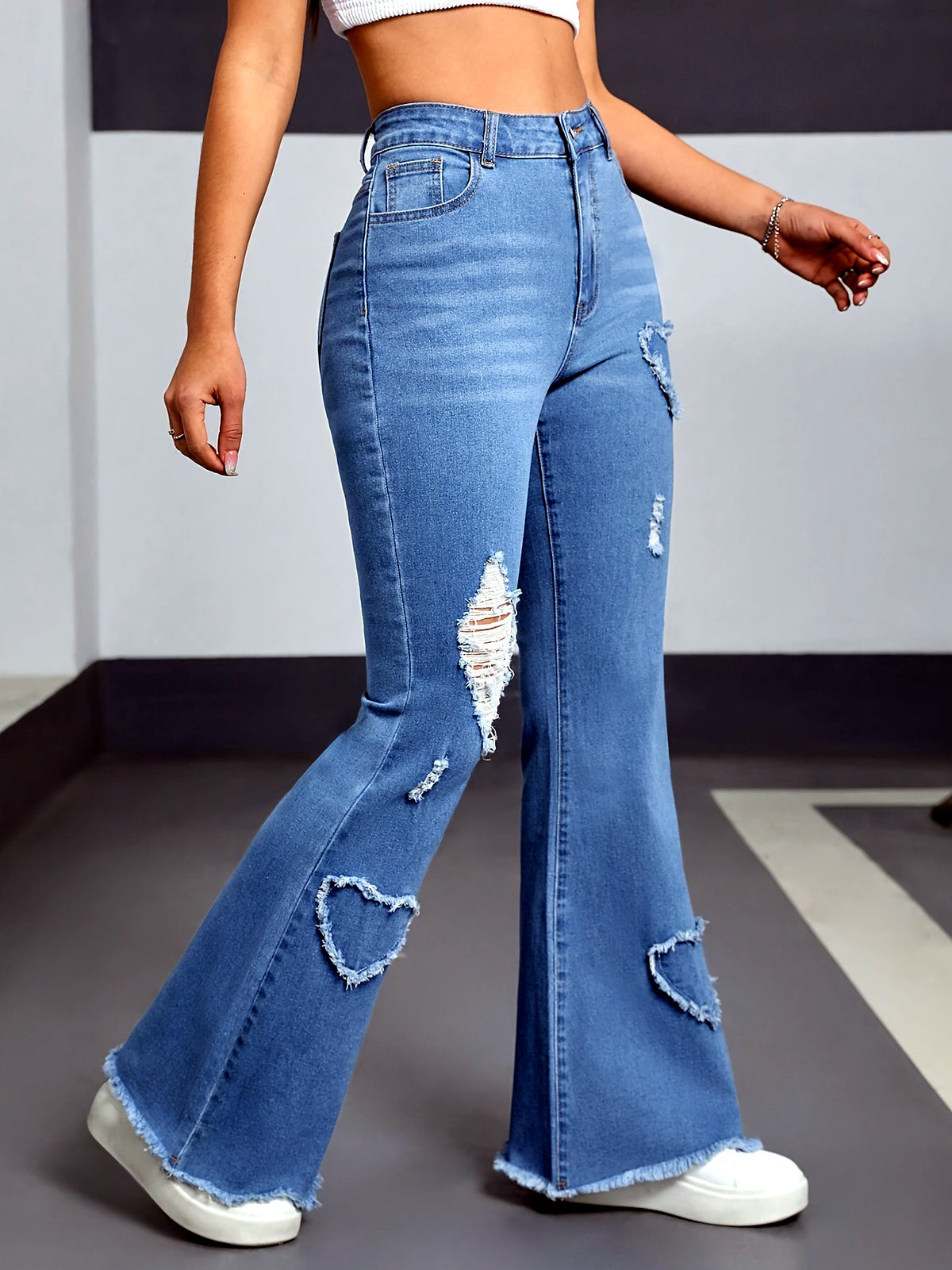 Women's Washed Denim Solid-Color Distressed Raw-Hem Mid-Rise Jeans - product detail view 2