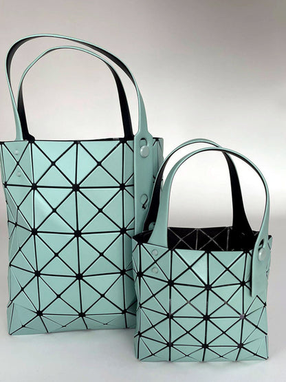 Women's Quilted Zip-Top Patchwork Handbag in Blue - product view