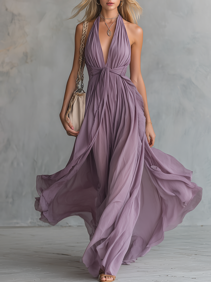 Robe longue en mousseline élégante et stylée avec col montant et décolleté en V sans manches