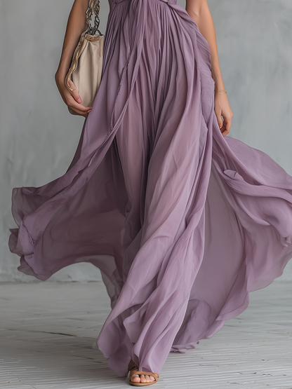 Robe longue en mousseline élégante et stylée avec col montant et décolleté en V sans manches