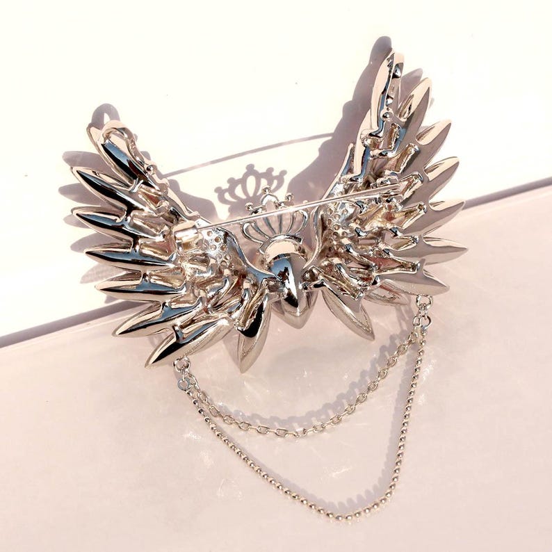 Crystal Butterfly Wing Brooch: Crown Tassel Pendant