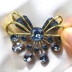 Retro palace style black bow brooch inlaid with blue zircon crystal