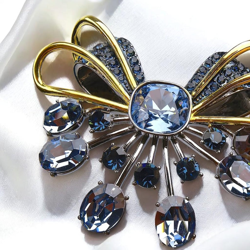 Retro palace style black bow brooch inlaid with blue zircon crystal