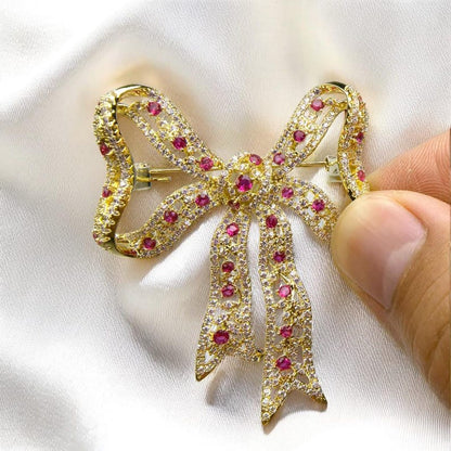 Broche vintage élégante avec nœud, cuivre original incrusté de cristal rouge