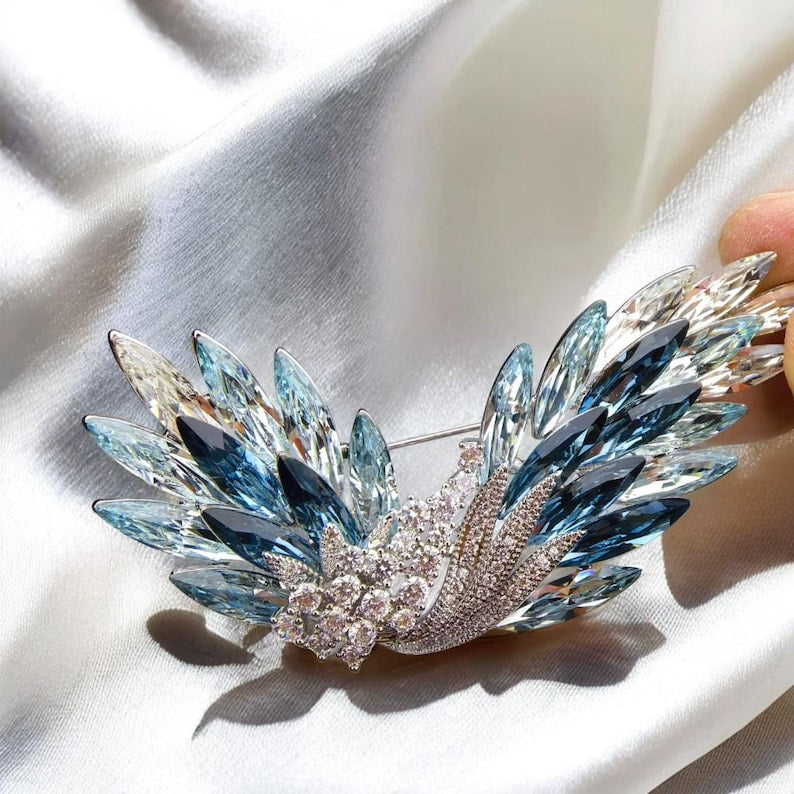 Original copper lake crystal wing brooch, blue gradient crystal inlaid with zircon