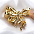 Palace French retro bow brooch inlaid with orange zircon