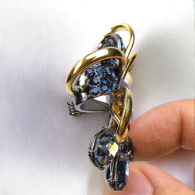 Retro palace style black bow brooch inlaid with blue zircon crystal