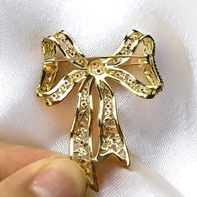 Vintage elegant bow brooch, original copper inlaid with red crystal