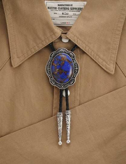Cravate bolo en lapis-lazuli : cravate de cowboy vintage en argent gravé, cordon en cuir végétalien