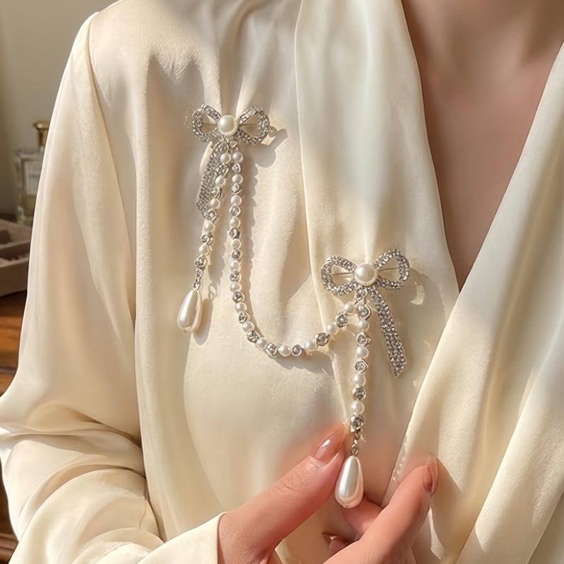 Pearl Chain Bow Brooch - Sparkling Dual-Bow Lapel Pin for Blazer Decor