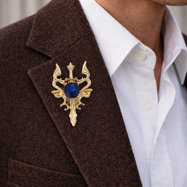 Gold Sword Lapel Pin with Blue Gem – Zinc Alloy Plated Brooch