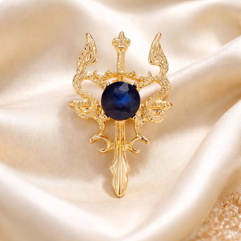 Gold Sword Lapel Pin with Blue Gem – Zinc Alloy Plated Brooch