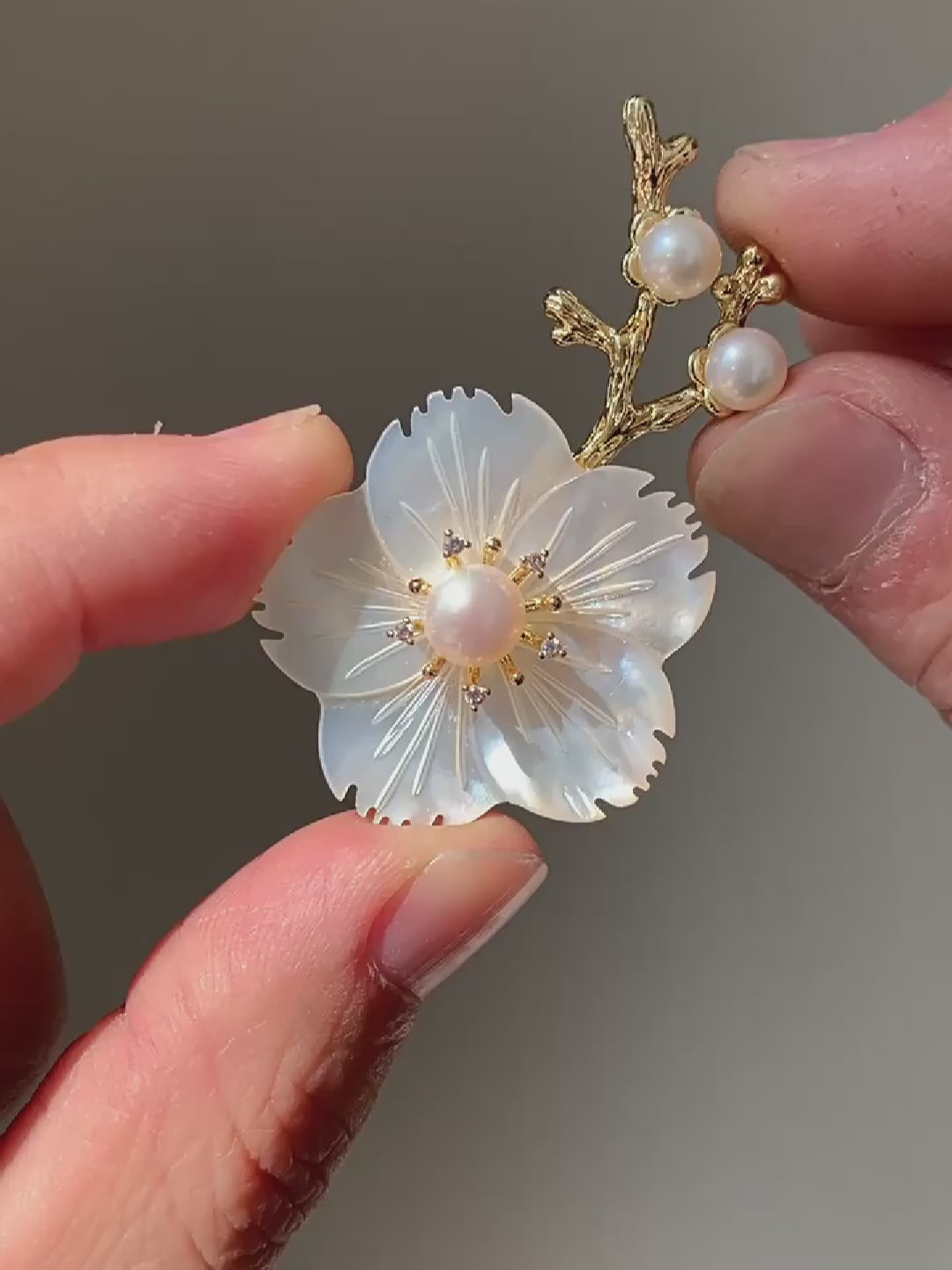 Load video: Mother of Pearl Blossom Shell Brooch Copper Inlaid Zircon Pin for Women