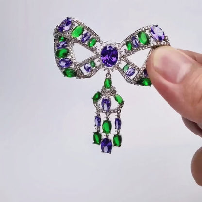 Palace retro tassel bow brooch, inlaid with green and purple crystals, pendant tassel design