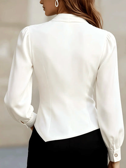 Women's draped button-front asymmetric blouse in white, back model view.