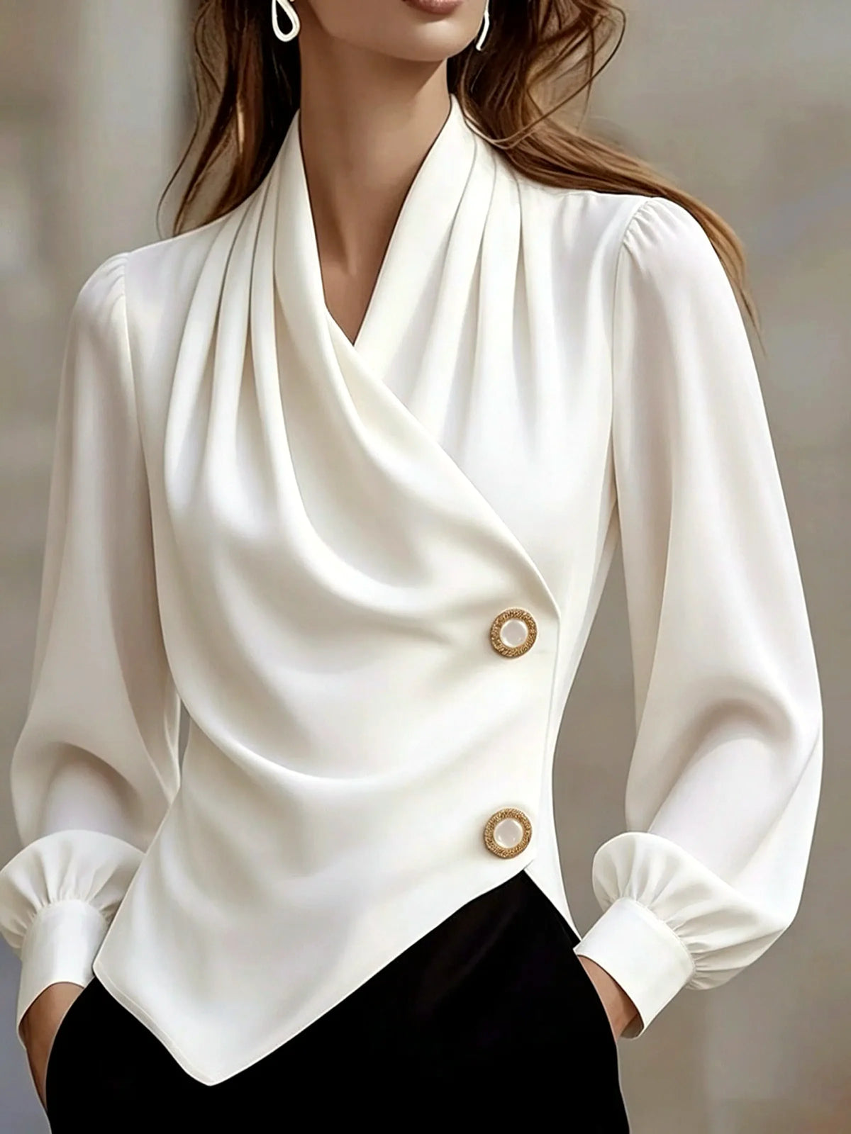 Women's draped button-front asymmetric blouse in white, front model view.