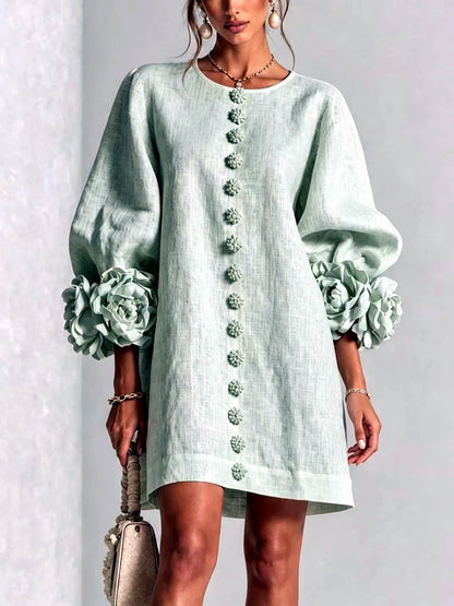 Women's floral-cuff button-front relaxed dress in mint green, front model view.