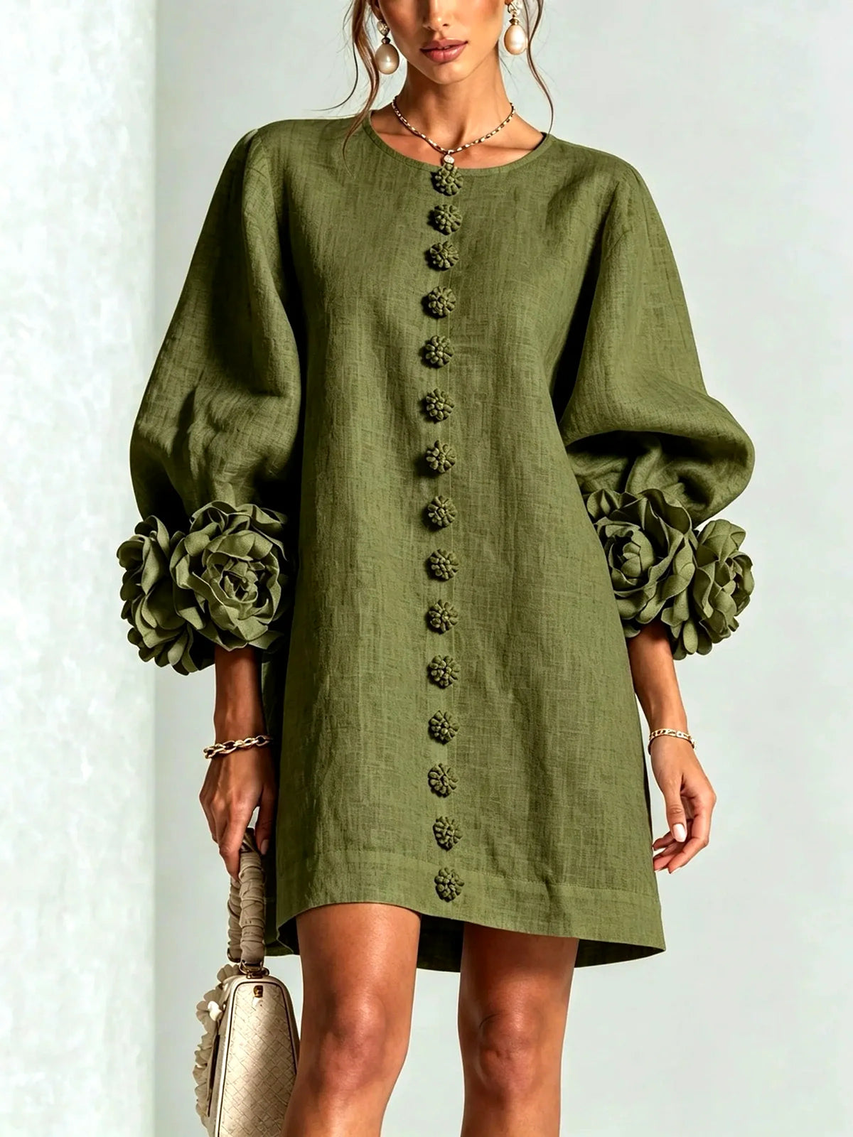 Women's floral-cuff button-front relaxed dress in olive green, front model view.