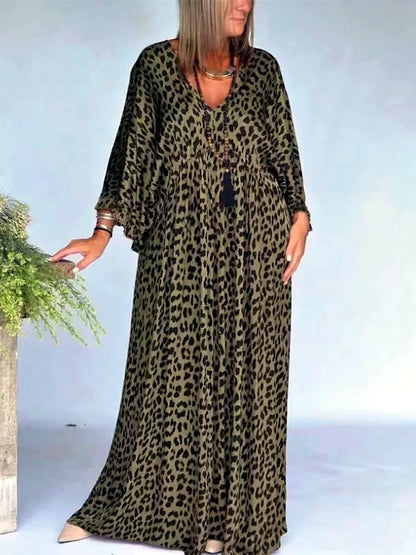 Women's leopard-print V-neck maxi dress in olive and black, front model view.