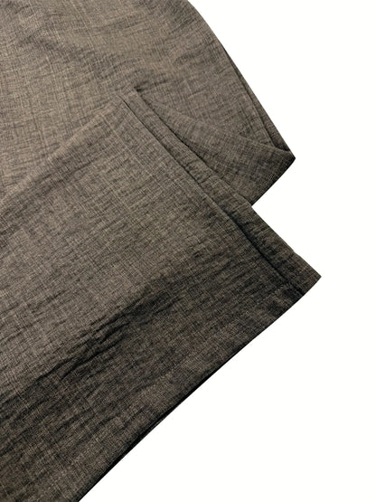 Women's linen-blend relaxed top and wide-leg pants set in taupe, hem and fabric texture detail.