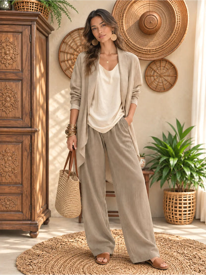 Women's linen-blend relaxed top and wide-leg pants set in taupe, lifestyle model view.