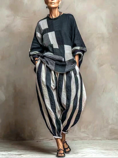 Women's patchwork top and striped relaxed pants set in black and gray, front model view.