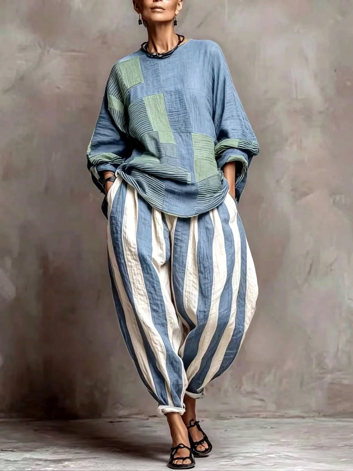 Women's patchwork top and striped relaxed pants set in blue and green, alternate model view.