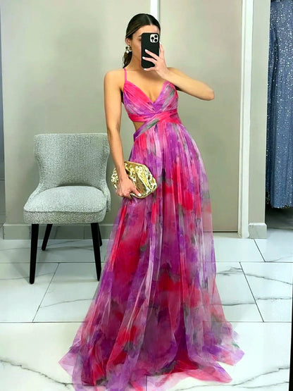 Women's printed cutout-waist maxi dress in pink multicolor, front mirror view.