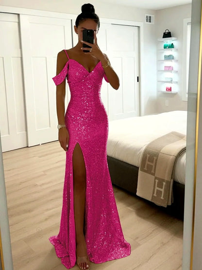 Women's sequin cold-shoulder slit evening gown in magenta, front mirror view.