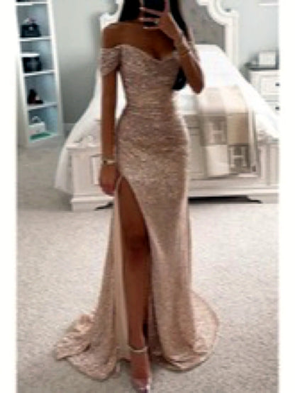 Women's sequin off-shoulder slit evening gown in champagne, front mirror view.