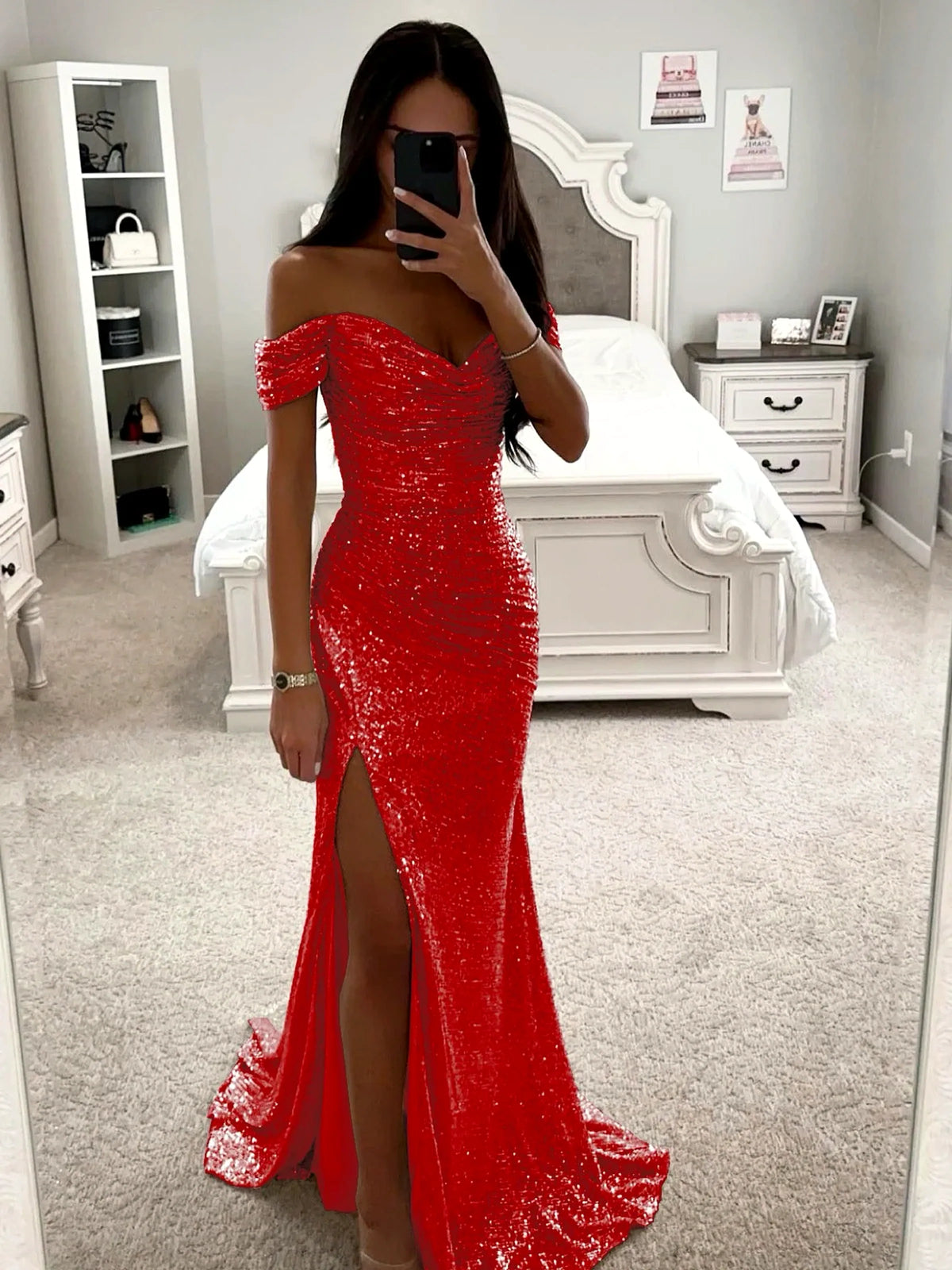 Women's sequin off-shoulder slit evening gown in red, front mirror view.