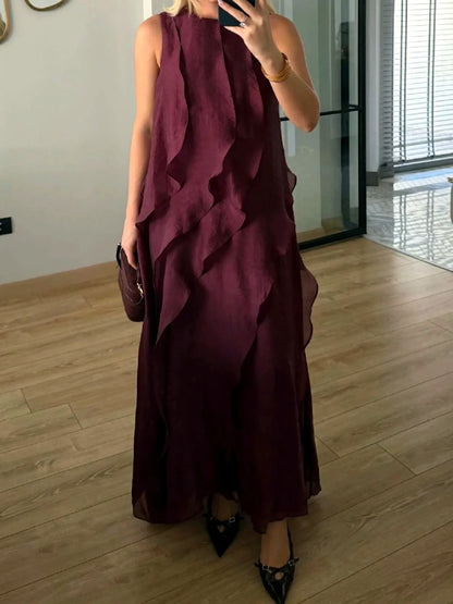Women's sleeveless layered ruffle maxi dress in burgundy, front mirror view.