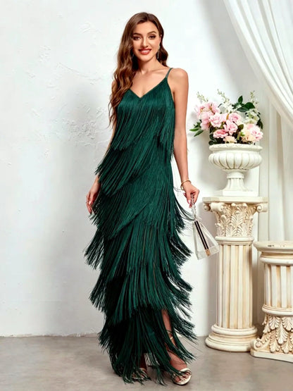 Women's sleeveless tiered fringe maxi dress in green, front model view.
