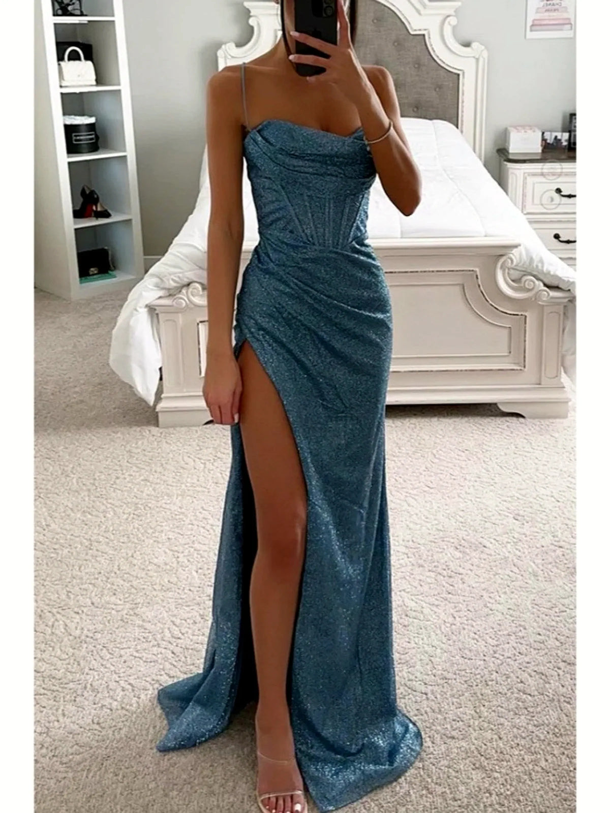 Women's strapless sweetheart slit evening gown in blue, front mirror view.