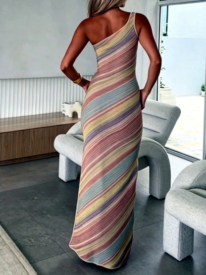Women's striped one-shoulder maxi dress in pastel multicolor, back model view.