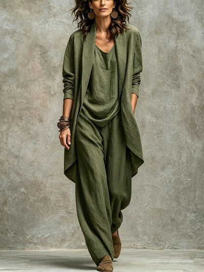 Women’s army green textured asymmetric top and wide-leg pants set with an open-front layer and natural fabric folds.