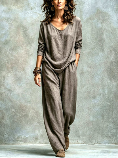 Women’s taupe textured top and wide-leg pants set, showing the relaxed draped fit and natural fabric folds.