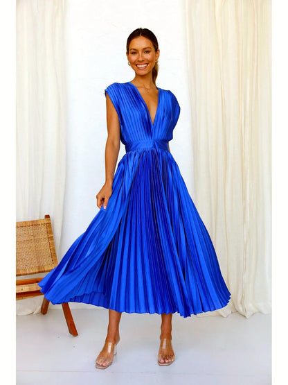 Women's V-neck pleated midi dress in blue, twirl model view.